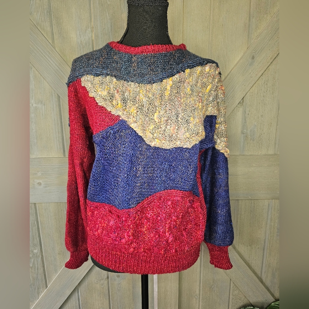 Vibrant Red and Blue Crew Neck Sweater with Unique Texture